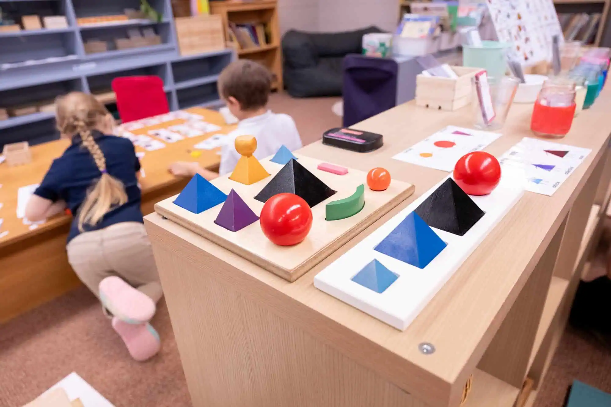 Montessori Language Arts Materials sitting on a shelf